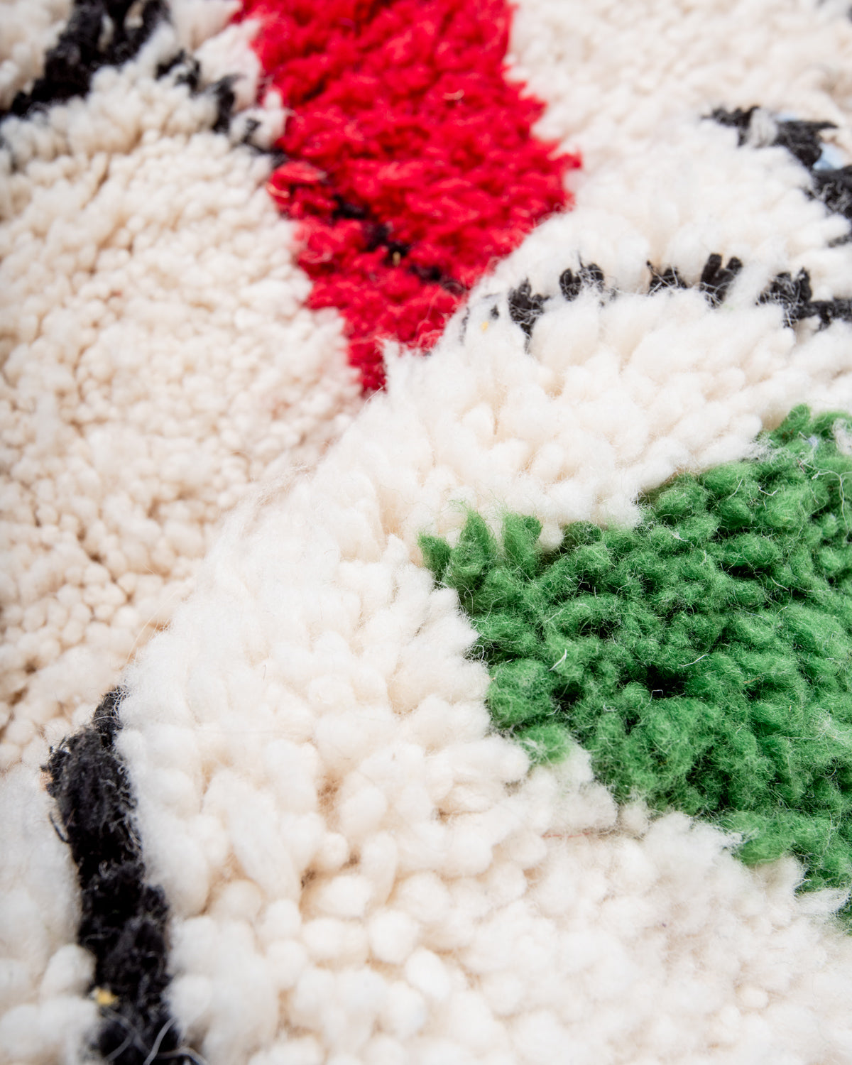 Modern, designer, handcrafted Berber rug from Morocco. Beniourain carpet with beautiful colours and patterns and fluffy wool texture.